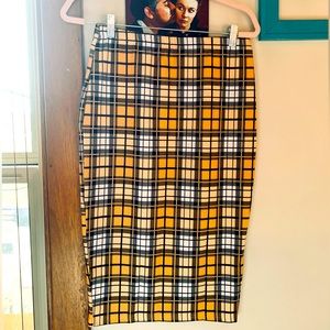 Midi length yellow plaid skirt